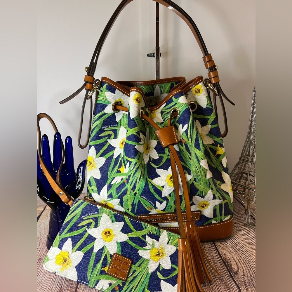 - Dooney and Bourke DAFFODIL  Drawstring Tassel Bag  EX COND…SORRY NO WRISTLET